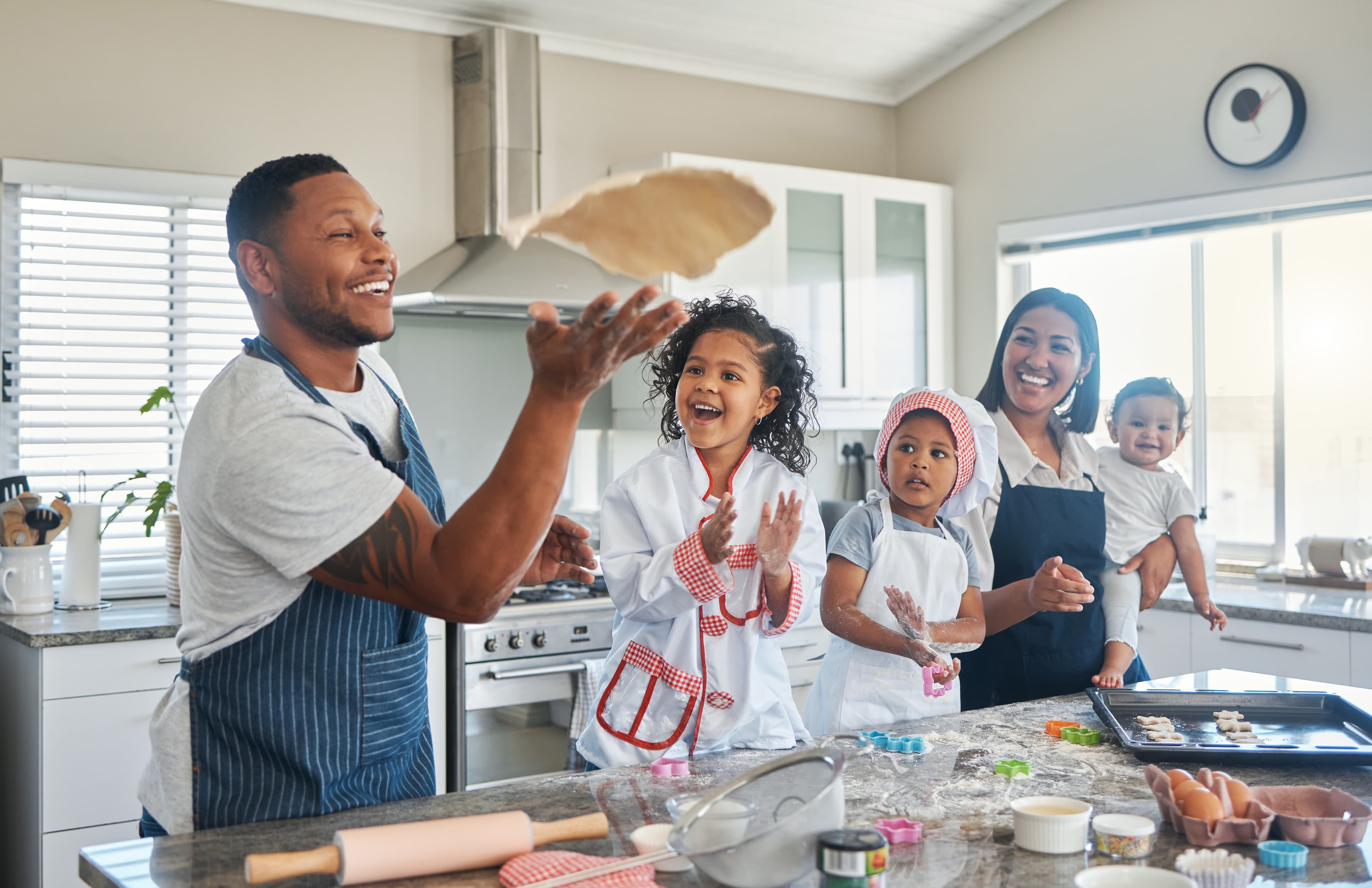 Family cooking together in the kitchen