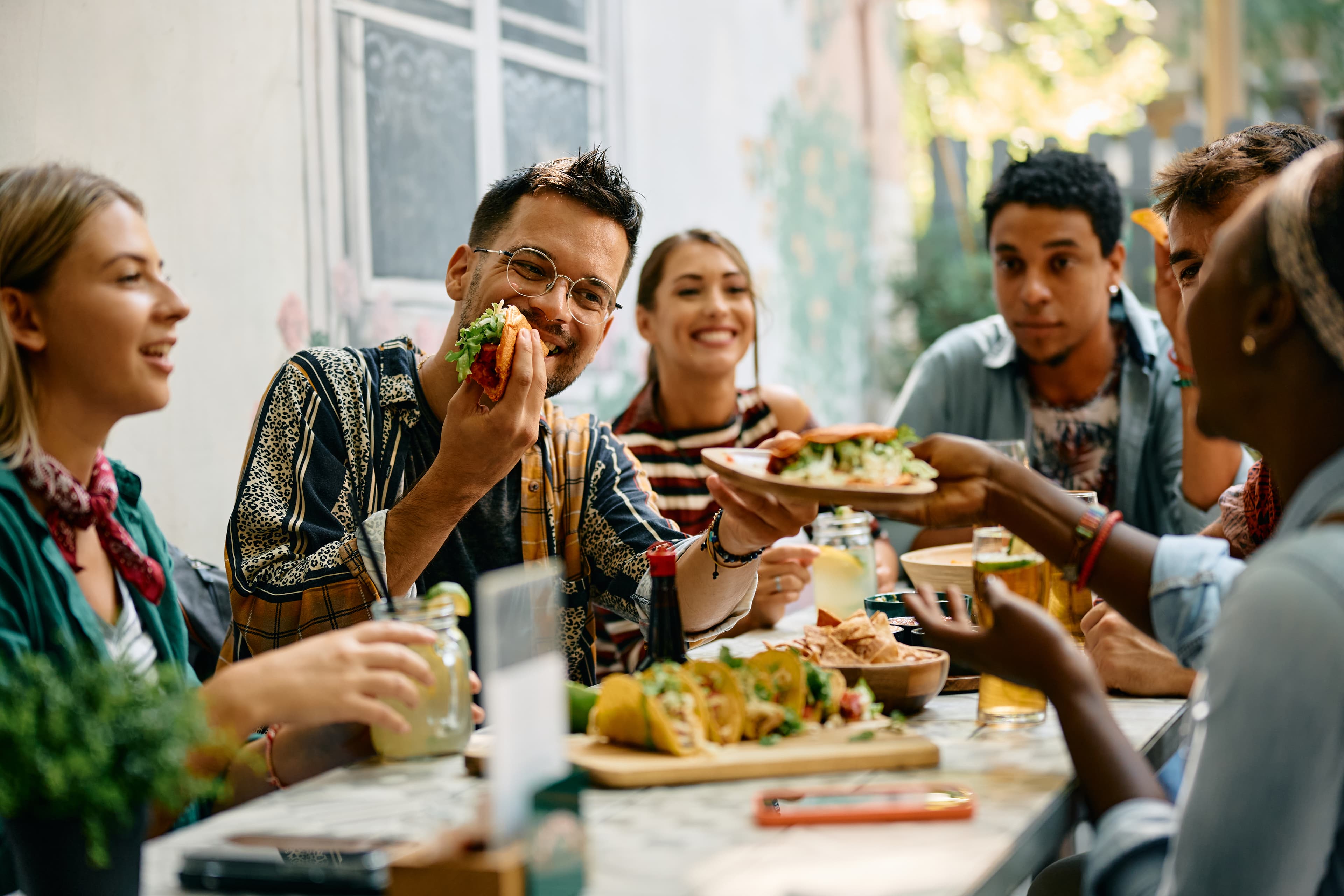 Group of friends dining outdoors