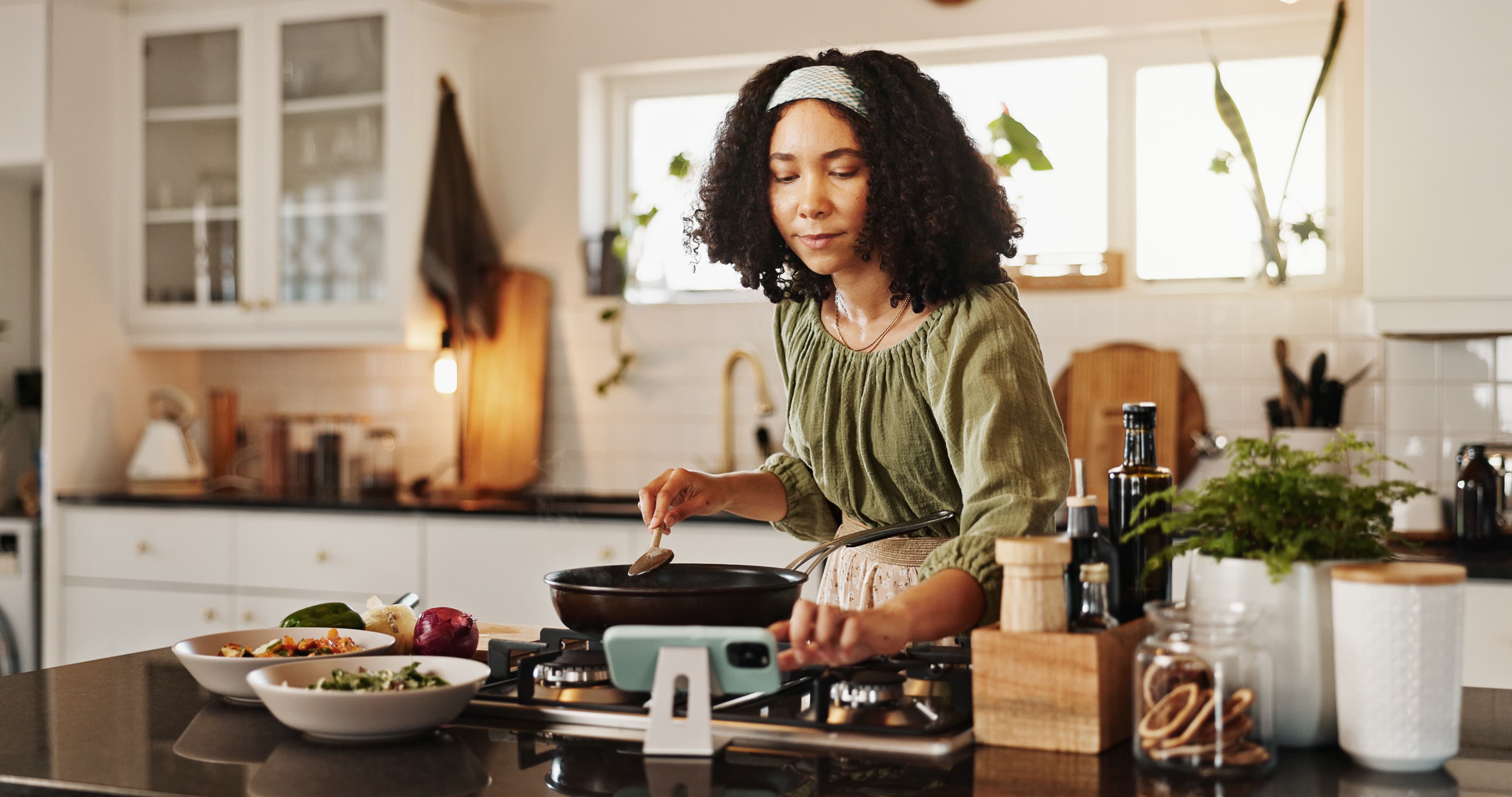 Woman cooking a delicious meal at home