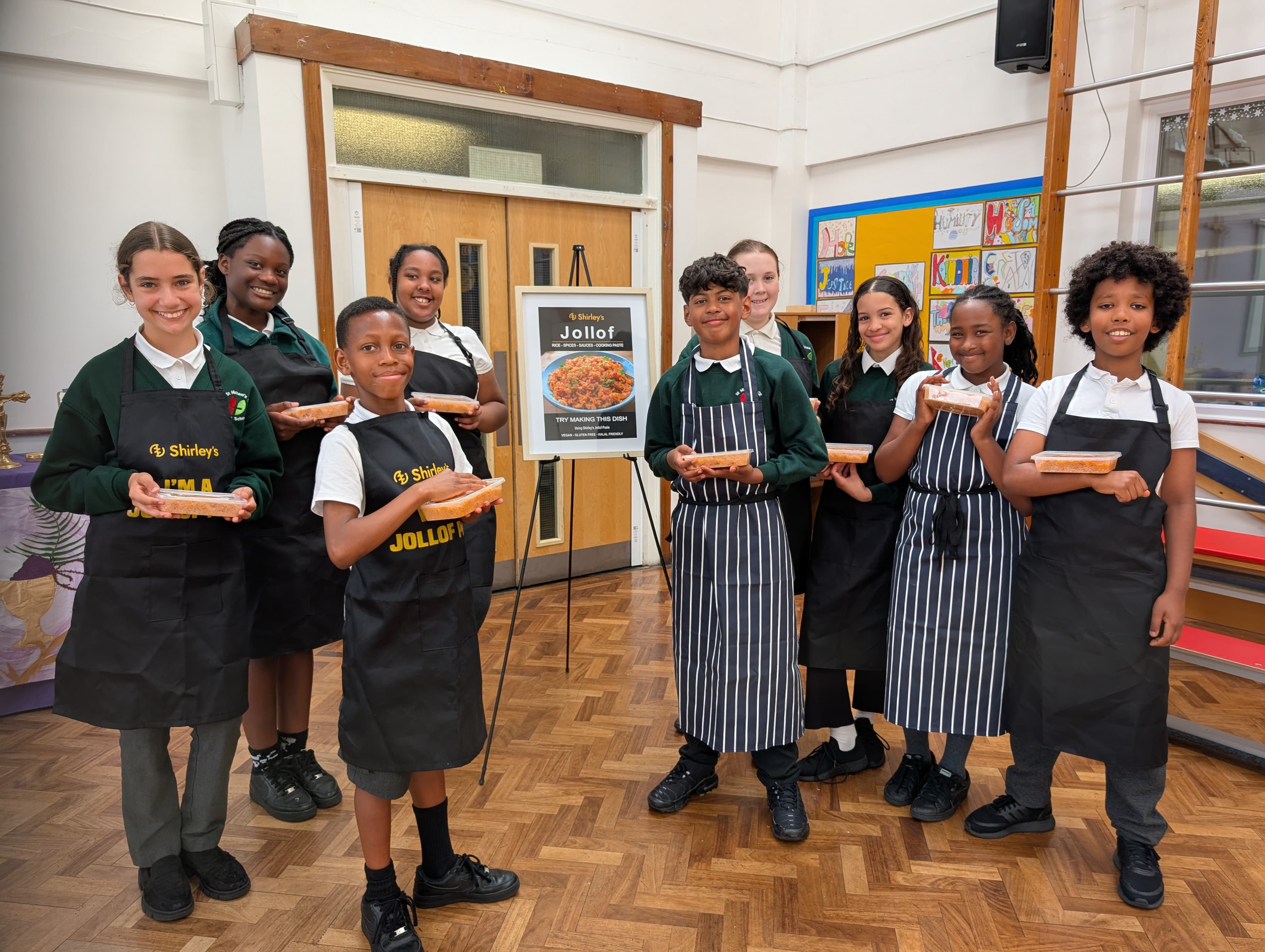Students with Jollof dishes